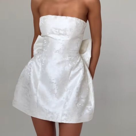 BABYBOO viral Elenora white bow dress Cute Wedding Rehearsal Outfits, Grad Dress White, White Grad Dress, Graduation Dress White, White Bow Dress, White Dress Aesthetic, White Engagement Dresses, Luxe Wedding Dress, Classy Short Dresses