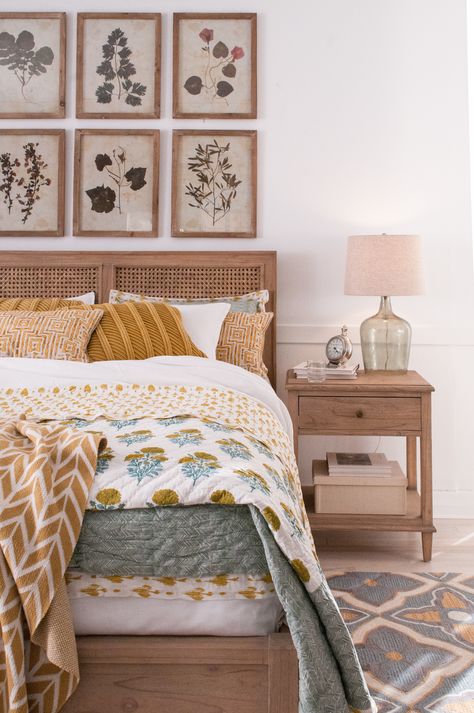 Yellow And Blue Boho Bedroom, Green And Mustard Bedding, Anthropologie Guest Bedroom, Bedding With Pattern, Floral Bedspread Aesthetic, Bedroom Neutral With Pop Of Color, White And Blue Boho Bedroom, Master Bedrooms Decor With Color, Breezy Bedroom Ideas