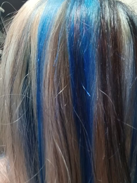 Chunky Blue Highlights In Blonde Hair, Blonde Hair Dark Blue Highlights, Blue And Blonde Skunk Stripe Hair, Blonde With Dark Blue Highlights, Brown Hair With Blonde And Blue Highlights, Blue Hair With Highlights Blonde, Light Blue Chunky Highlights, Blue Black Blonde Hair, Blonde Blue And Black Hair