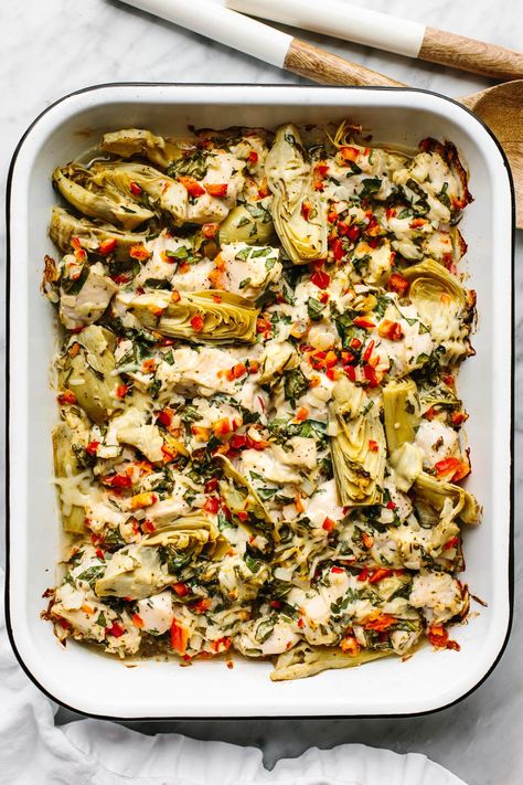 This spinach artichoke chicken bake is savory, cozy, and layered with loads of chicken and veggies for the perfect all-in-one meal prep dish. Downshiftology Recipes Chicken, Chicken Pesto Artichoke Bake, Chicken Artichoke Sundried Tomato Recipe, Pesto Artichoke Chicken, Crockpot Chicken Artichoke Recipes, Downshiftology Chicken, Chicken And Artichoke Recipes, Spinach And Chicken Recipes, Chicken Spinach Artichoke Lasagna