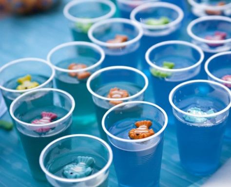 45 outrageous disney movie-inspired parties Finding Nemo Birthday Party, Finding Nemo Party, Nemo Birthday Party, Finding Nemo Birthday, Nemo Party, Hawaian Party, Nemo Birthday, Mermaid Cupcakes, Ariel Birthday