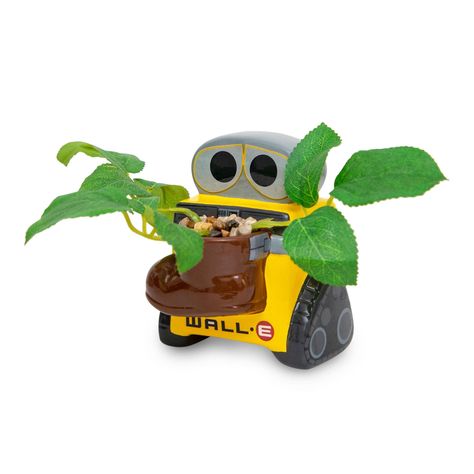 PRICES MAY VARY. JOURNEY TO THE STARS: Bring home a piece of the cosmos back to your humble abode on Earth. The waste-collecting robot has arrived in this form of this exclusive planter pot from Disney and Pixar's WALL-E. THE FUTURE IS NOW: Enjoy the adventure of a lifetime with this mini planter. The unique character mold is authentically sculpted to look like WALL-E is holding a shoe, complete with a plastic plant sprouting out. MEETS THE AXIOM'S STANDARDS: Decorate with this ceramic planter m Plant For Desk, Hercules Pegasus, Disney Hercules, Small Flower Pots, Desk Shelf, Ceramic Ideas, Artificial Succulents, Grey Ceramics, Wall E