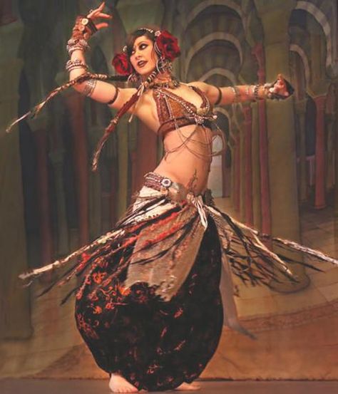 Rachel Brice, belly dancer. Love the skirt! Rachel Brice, Dancing Poses, Jitterbug, Body Reference Poses, Human Poses Reference, Dynamic Poses, Belly Dance Costumes, We Are The World, Figure Poses