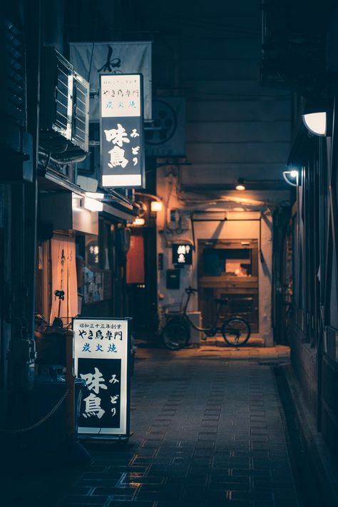 A narrow alley way with signs hanging from the ceiling photo – Free Japan Image on Unsplash Alley Way, Japan Image, City Japan, Tokyo Night, Hd Phone Wallpapers, Japan Tokyo, City Wallpaper, The Ceiling, Hd Photo