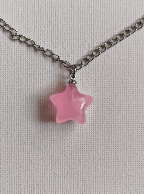 This adorable Kirby inspired pink Star necklace in silver is sure to make you think of every ones favourite lil pink guy ⭐. Who ever said Kirby is just for kids 🙈? Designed with a lobster clasp so it can fit both kids and adults! Goes perfectly with more of my one of a kind Kirby jewellery 🟣. A matching 3D kawaii sticker with every order so grab yours now 👀! All orders sent with tracked shipping for your peace of mind. More Kirby and kawaii jewellery on my store 🕹️. Feel free to pop me a message any time, I'll always get back to you asap 💕. Check out my store and thanks so much for shopping 🐣. Kawaii, Pink Star Necklace, Kirby Necklace, Kirby Accessories, Pink Guy, Kawaii Necklace, Pastel Necklace, Kirby Stuff, Kawaii Sticker