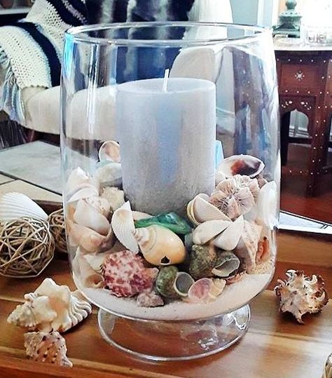 Clear Glass Hurricanes | Decorating Ideas with Candles, Beach Sand, Shells,  more - Coastal Decor Ideas Interior Design DIY Shopping Candle Holder Decor Ideas, Glass Vase Filler Ideas, Glass Vases Decor Ideas, Grand Vase Transparent, Beach Theme Candles, Beach Candles, Beach Candle Holder, Vase Filler Ideas, Glass Bowl Decor