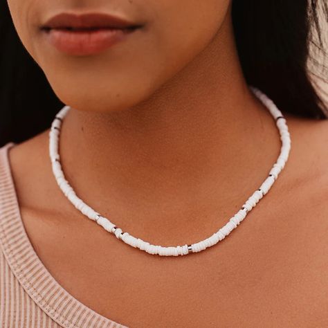 Nothing says classic coastal style like our Puka Shell Choker. With a strand of all-natural, raw puka shell beads, this made-to-layer design features silver spacer beads spread throughout to elevate the look and add a little shine. Pura Vida Necklace, Sup Accessories, Classic Coastal, Puka Shell Necklace, Choker Necklace Designs, Beachy Jewelry, Necklace Outfit, Shell Choker, Pura Vida Bracelets