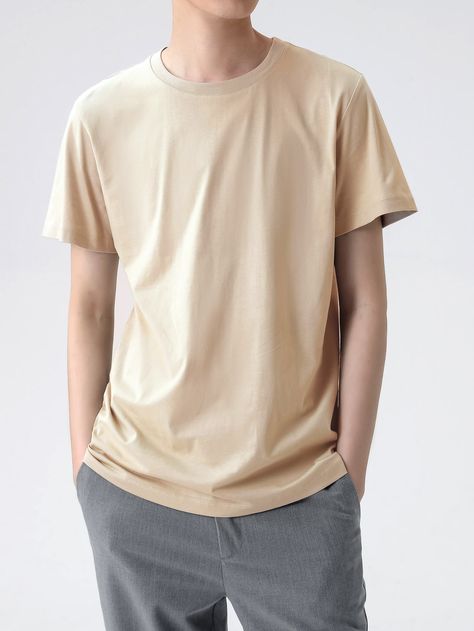 Men In Plain T Shirt, Plain Tees Outfit Men, Plain Shirt And Shorts Outfit Men, Khaki Tshirt Outfits, Cream T Shirt Outfit Men, Plain Outfits Men, Cream T Shirt Outfit, Beige Tshirt Outfits Men, Plain T Shirt Outfit Men