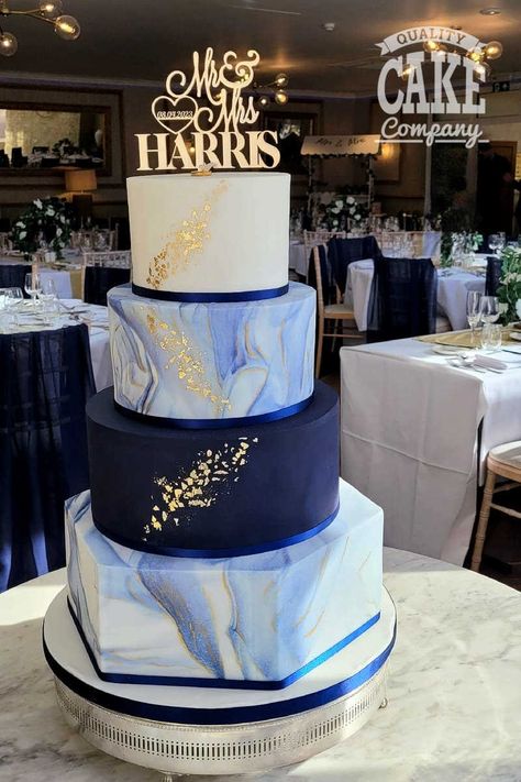Navy blue four tier large wedding. Hexagon marble gold. Fairlawns Hotel Blue White And Gold Wedding Cake, Navy Blue Sweet 16 Cake, Quinceanera Cake Ideas Blue, Blue And Rose Gold Wedding Cake, Navy And Pastel Wedding, Navy Blue Gold Wedding Cake, Navy Blue White And Gold Wedding Cake, Wedding Cake Designs Blue And White, Blue Cake Quinceanera