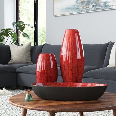 Showcasing bold colours and exquisite details, this set of decorations includes two vases and one bowl. Each piece features a stunning panela red finish with black accents. This three-piece set is extremely versatile: display the pieces together or separately in a bedroom, living room, dining room, hallway, or office. Black White And Red Home Decor, Black And Red Home Decor, Vase Decorating Ideas Living Room, Beige Dining Room Chairs, Red Living Room Decor, Red Coffee Tables, Coffee Table Decor Living Room, Red Living Room, Brown Candles