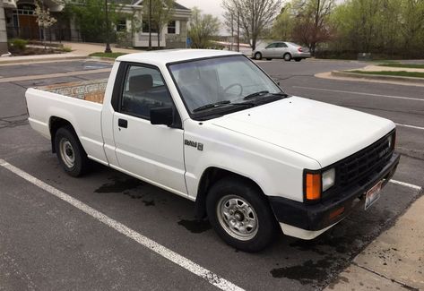 Big Fan - Small Truck: 1987 Dodge Ram 50 - http://barnfinds.com/big-fan-small-truck-1987-dodge-ram-50/ Dodge Pickup Trucks, Small Pickups, Dearborn Michigan, Dodge Pickup, Mitsubishi L200, Scammer Pictures, Small Trucks, Ford Vehicles, Van Car