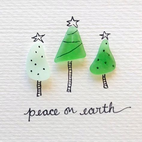 Original sea glass artwork featuring three adorable Christmas trees. Trees are made to order, and the color of the glass will vary. Please choose whether you would like your piece to say, 'Joy to the World' or 'Peace on Earth', or your own phrase i.e. 'The Parkers' 'Season's Greetings', etc. All sea glass is found by artist Ashley Lucas and her son on their morning walks on the NJ Shore. When our well runs a little dry - additional pieces are graciously provided by friends & neighbors that live Natal, Sea Glass Diy, Sea Glass Artwork, Sea Glass Art Diy, Nj Shore, Sea Glass Art Projects, Seaglass Art, Beach Glass Crafts, Beach Pebbles