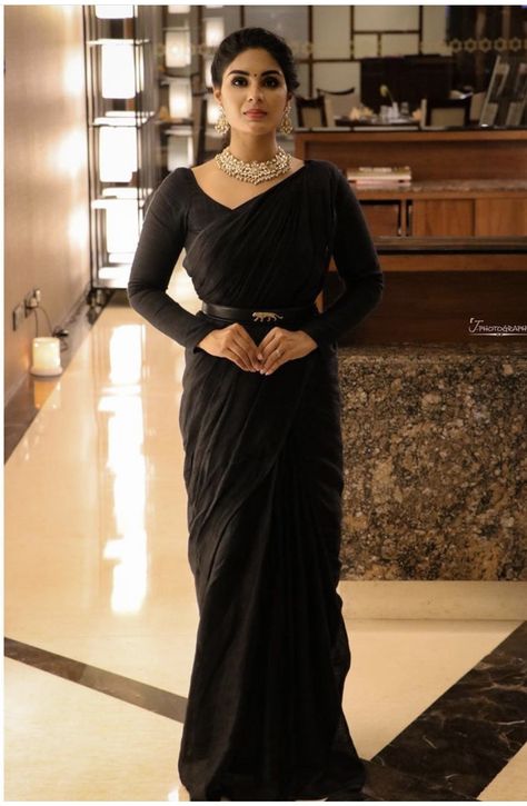 Plain black saree, full sleeves blouse, saree with belt Plain Saree With Full Sleeve Blouse, Black Saree Full Sleeve Blouse, Black Saree With Full Sleeve Blouse, Black Full Sleeve Blouse Saree, Black Blouse Full Sleeves Designs, Black Saree Jewellery Ideas, Full Sleeve Black Blouse, Black Saree Outfit Ideas, Plain Black Blouse Designs For Saree