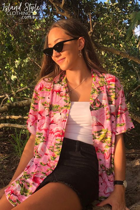 WOMENS CUT RAYON HAWAIIAN SHIRT - Can be easily paired with your favourite wardrobe staples. Perfect for a music festival, beach party, Aloha Friday or casual wear. Features and open neck collar, coconut buttons, short sleeves with a turned-up cuff with button detail. Matching items for the whole family available! #hawaiianshirt #partyshirt #alohashirt #festivalshirt #uniforms #alohafriday #pinkflamingo #flamingoclothing #ladieshawaiianshirt #party #hawaiianthemed #flamingoshirt #womens #shirt Flamingo Hawaiian Shirt, Women Hawaiian Shirt Outfit, Women Hawaiian Shirt, Modern Hawaiian Outfit, Styling Hawaiian Shirts Women, Hawaiian Shirts For Women, Aloha Shirt Outfit Women, Hawaiian Dresses For Women Party, Hawaiian Party Outfit Women