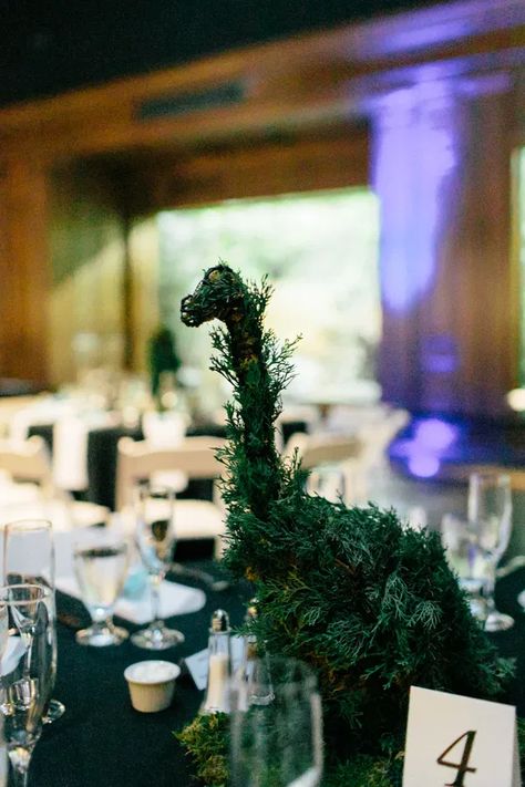 Fossil Wedding Theme, Dinosaur Topiary, Science Wedding Theme, Museum Wedding Ideas, Jurassic Park Wedding, Dinosaur Centerpieces, Dinosaur Wedding Theme, Jurassic Wedding, Dinosaur Display