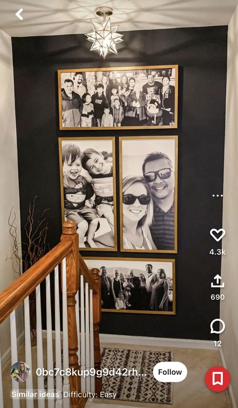 Stairway Landing Gallery Wall, Black Wall With Pictures, Family Photo Wall Mixed Frames, Family Portrait Display Ideas, Downstairs Wall Ideas, Staircase Ledge Decor, Smallwoods Black And White Photos, Large Wall By Stairs Decor, Basement Stairs Wall Decor Ideas