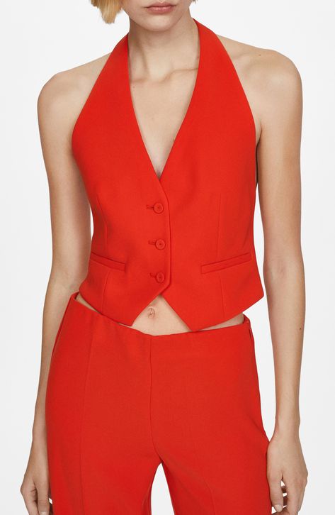 Achieve night-out perfection in this cool cropped vest designed in a sleek halter silhouette. Front button closure Halter neck Front welt pockets Attached belt Partially lined 100% polyester Machine wash, line dry Imported Manche, Couture, Red Suit Vest, Suit Vest Women, Red Waistcoat, Halter Vest, Suit Waistcoat, Mango Suit, Gilet Costume