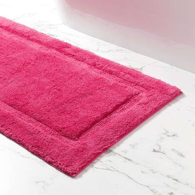 Beautify the bath with this classic, plush, absorbent, and luxurious essential offered in a range of fresh and happy colors. Cloud-like softness as you step out of the shower comes from a dense, soft, and substantial long-staple cotton. This bath rug has a superbly high pile offset by a woven decorative border. Size: 20" W x 30" L, Color: Fuchsia | Pine Cone Hill Classic Bath Rug 100% Cotton in Pink, Size 20" W x 30" L | Wayfair Pink Bath Mat, Pine Cone Hill, Sheer Curtain Panels, Annie Selke, Dash And Albert, Decorative Borders, Cotton Bath Towels, Kids Bathroom, Classic Rugs