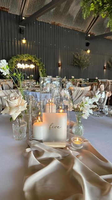 Wedding Centerpieces With Glass Vases, Candles And Vases Wedding, Bud Vase Table Decor Wedding, Candle Vases Centerpieces, Table Decor With Candles And Flowers, Candlelit Centerpieces Wedding, Centerpieces That Are Not Flowers, Feast Style Wedding Table, Bud Glasses Wedding