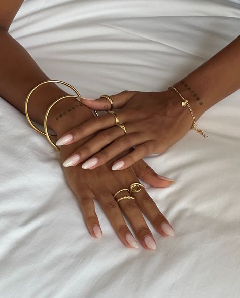 Wrap your hands in gold. #statementrings #fashionjewelry #jewelrytrends #layering #jewelrystyling #ringstacking How To Wear Rings On Both Hands, Rings On Both Hands, Gold Hand Jewelry, Hand Stack, Wear Rings, African Outfits, How To Wear Rings, Stacked Jewelry, Demi Fine Jewelry