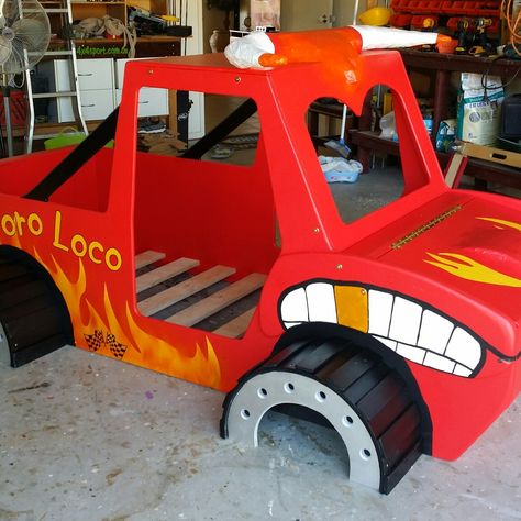 Monster truck 'El Toro Loco' with toybox in engine bay Monster Jam Bedroom Ideas, Monster Truck Storage Ideas, Monster Truck Room Ideas Boys, Monster Jam Bedroom, Monster Truck Bedroom Ideas, Monster Truck Themed Bedroom, Wagon Floats, Truck Themed Bedroom, Monster Truck Room Decor