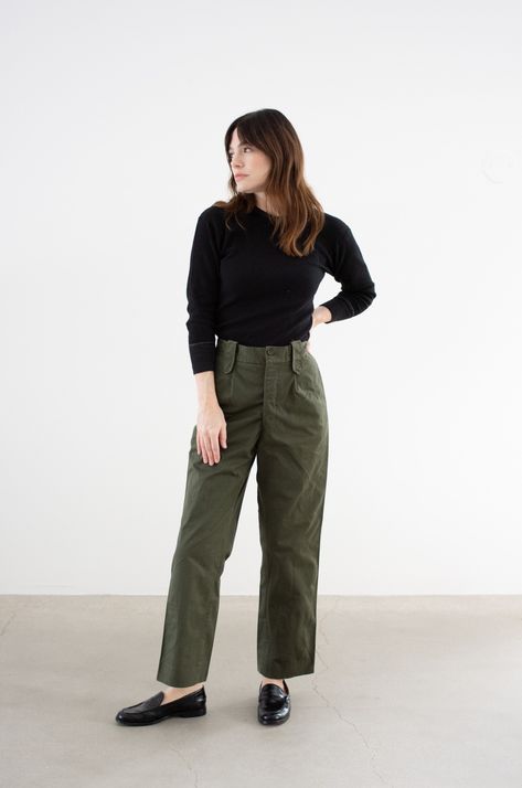 "These olive green pants feature a straight tapered leg, button fly, two front pockets, two back flap pockets, belt loops. High-Rise. Unisex.  Maker: Military  |  Material: 100% Cotton  Condition: Great! Deadstock. A few faint marks on the back. Measurements:  Waist: 29\"  |  Rise: 12\"  |  Hips: 39\"  |  Thigh: 12\" flat  |  Inseam: 28.5\"  |  Leg Opening: 8.25\" Cassie is 5'8\" and wears a modern 0-2 with 25-26\" waist and 36\" hip.  SHOP http://www.rawsonstudio.etsy.com FOLLOW US + instagram | @_rawson + pinterest | rawson *No Returns. Items are eligible for store credit only. We ask that the buyer ship to provided address and a credit code is issued for one year.*" Army Green Flare Pants Outfit, Army Green Pants Outfit Work, Green Office Pants, Olive Green Trousers Outfit Women, Dark Green Jeans Outfit, Black And Olive Green Outfit, Green Shirt Outfit Women, Casual Khaki Pants Outfit, Olive Green Trousers Outfit