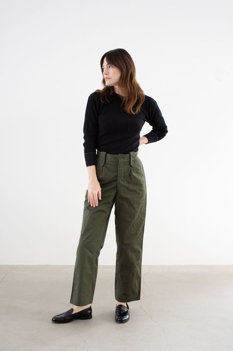 "These olive green pants feature a straight tapered leg, button fly, two front pockets, two back flap pockets, belt loops. High-Rise. Unisex.  Maker: Military  |  Material: 100% Cotton  Condition: Great! Deadstock. A few faint marks on the back. Measurements:  Waist: 29\"  |  Rise: 12\"  |  Hips: 39\"  |  Thigh: 12\" flat  |  Inseam: 28.5\"  |  Leg Opening: 8.25\" Cassie is 5'8\" and wears a modern 0-2 with 25-26\" waist and 36\" hip.  SHOP http://www.rawsonstudio.etsy.com FOLLOW US + instagram | @_rawson + pinterest | rawson *No Returns. Items are eligible for store credit only. We ask that the buyer ship to provided address and a credit code is issued for one year.*" Olive Green Bootcut Pants Outfit, Army Green Flare Pants Outfit, Olive Green Cropped Pants Outfit, Business Casual Green Pants, Styling Olive Green Pants, Green Trousers Outfit Women, Army Green Pants Outfit Work, Green Pants Outfit Casual, Army Green Joggers Outfits