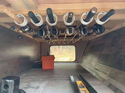 diy fishing rod storage in camper Camper Fishing Rod Storage, Camp Trailer Organization Ideas, Rv Fishing Pole Storage Travel Trailers, Organisation, Towel Storage In Camper, Inside Camper Storage Ideas, Camper Storage Compartment Organization, Camper Pass Through Storage Ideas, Camp Trailer Living