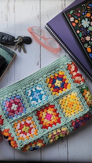 Handmade Crochet Bags by Alev on Instagram: "Colorful Crochet Granny Square Clutch which can be use as an All day pouch or also as a cosmetic purse, make up bag or toiletrie clutch in Boho style 🤗🤗⛱️🌴 📍33×23cm 📍100% handmade 📍Linned ,with a small pocket inside and closure zipper 📍I used Washable cotton yarns You can wash your bag in sensitive section. 🧡🩷❤💛💚💙🩵💜🤍🩶 #crochetbagpatterns  #crochetclutchbag #crochetclutch #crochetbaghandmade  #grannysquarebag #bohobags #crochetmarketbag Patchwork, Granny Square Zipper Bag, Granny Square Zipper Pouch Pattern, Granny Square Clutch Pattern, Granny Square Makeup Bag, Pochette Granny Crochet, Granny Square Zipper Pouch, Small Granny Square Projects, Crochet Granny Square Pouch