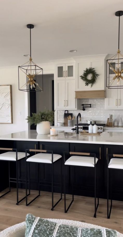 Two toned kitchen cabinets are a gorgeous design trend and we're sharing 17 of our favorite kitchens for inspiration! 3 Tone Kitchen Cabinets Modern, Single Line Kitchen Design, Tan Black And White Kitchen, Neutral Black Kitchen, Two Toned Kitchen Island, Black Two Tone Kitchen Cabinets, Two Toned Cabinets Kitchen Color Combos, Tri Color Kitchen Cabinets, Two Toned Cabinets Kitchen
