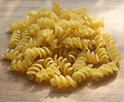 Rotini are spirals of pasta that are good at gripping onto chunky sauces. Fusilli 1 cup uncooked = 175 g / 6 oz 2 1/2 cups uncooked = 225g / 8 oz = 3 cups (450 g / 1 pound) cooked The Italian word rotini is from the same origins as the English word rotate, rotation, etc. Tagliatelle, Fusili Pasta, Language Notes, Raw Pasta, Goblin Korean Drama, Spiral Pasta, Fusilli Pasta, Italian Word, Rotini Pasta