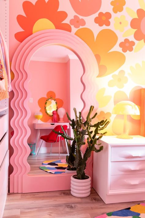 Pink wavy full length mirror in colorful bedroom. Bohemian 70s Decor, Trendy Retro Bedroom, Colorful Groovy Bedroom, Groovy Office Aesthetic, Groovy Lash Room, 70s Groovy Bedroom Aesthetic, Pink Room Furniture, Retro Pastel Bedroom, Pink And Yellow Home Decor