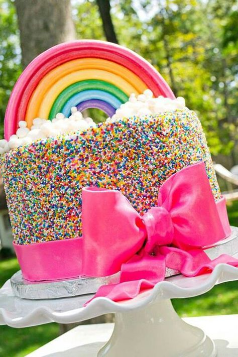 Lovely Rainbow Cake - I like the colors she used instead of Primary colors. And both the bow & rainbow is pearly. Gökkuşaği Pasta, Sprinkles Birthday Cake, Trolls Cake, Jojo Siwa Birthday, Decoration Patisserie, Rainbow Birthday Cake, Trolls Birthday Party, Rainbow Parties, My Little Pony Party