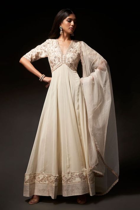 White padded anarkali with an empire waistline featuring floral zardozi embroidery and floral patterned border on hem. Comes with scallop lace dupatta. - Aza Fashions Kavitha Gutta, Lace Anarkali, Lace Dupatta, Bridal Anarkali, Anarkali Designs, Anarkali With Dupatta, White Anarkali, Indian Anarkali, Desi Dress
