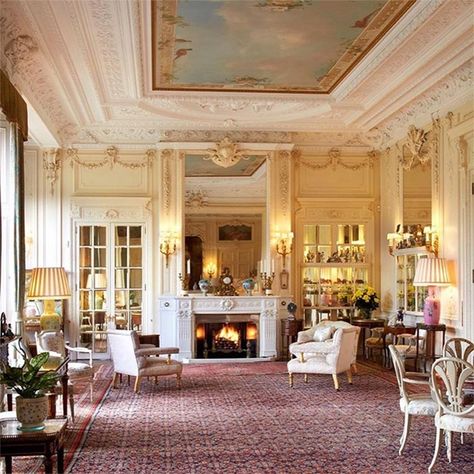 Photo: © Instagram Drawing Room The Sandringham Estate shared this stunning photo of the opulent Drawing Room on Instagram in July 2020. In a caption, it explained that the room had been described as "a very long and handsome drawing room" in a diary entry by Queen Victoria in 1871.It features a striking trompe l'oeil ceiling panel with a golden pheasant painting overlooking the room below, which has cream walls with ornate carved detailing and two sets of floor-to-ceiling mirrored doors at th Inside Windsor Castle, Ratu Elizabeth, Sandringham House, Norfolk House, Castle Rooms, Cambridge House, Sandringham Estate, Mahogany Dining Table, Drawing Room Decor