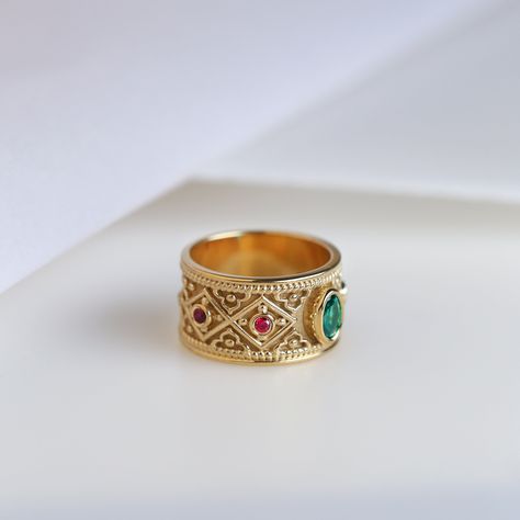 A beautiful Byzantine-style inspired ring.*real images of the ring, taken by us*Dimensions: 11mm widthGemstones:- Simulated Emerald (cubic zirconia)- Simulated Ruby (cubic zirconia)Material:- Sterling Silver (925)- 9K Gold (375)- 14K Gold (585)- 18K Gold (750)*All signet rings are hallmarked on the back for certification*- We offer FREE Worldwide DHL & FedEx Shipping!- Branded DanelianJewelry Gift Box with each order!Our customer service is available 7 days a week.Leave us your message, and we w Goldsmith Workshop, Byzantine Ring, Gold Ring For Men, Byzantine Gold, Byzantine Rings, Real Images, Multi Gemstone Ring, Signet Rings, Ring For Men