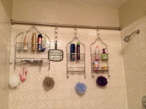 Install a tension rod in your shower and hang multiple shower caddies for additional storage. Shower Rods, Makeover Kamar Mandi, Rv Bathroom, Bathroom Hacks, Bathroom Storage Solutions, Shower Organization, Ideas Para Organizar, Creative Storage, Girls Bathroom