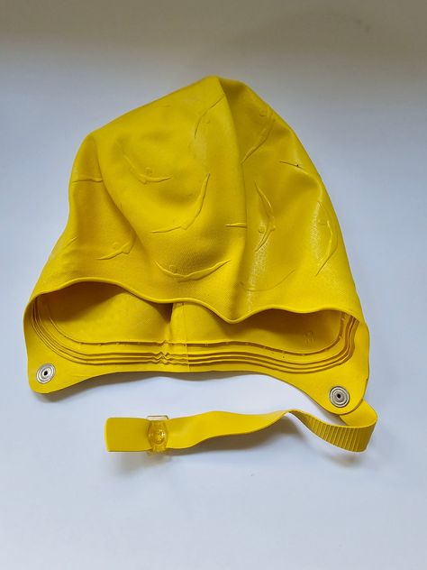 Super retro chic Janzen swim cap. Yellow with diving ladies pattern.  The cap is in excellent vintage condition with no signs of wear. The snaps function as they should and the rubber is in great shape. It isn't hard or brittle. The package does have some holes but it does not affect the quality or condition of the cap. The package says size Adult. I did not try it on so I'm unsure of the size. Please feel free to message me with any questions. This cap would make an awesome addition to your vintage swimwear and the color is so pretty!  Thanks for looking. Bathing Caps Vintage, Vintage Swim Cap, Bathing Cap, Swimming Cap, Bathing Costumes, Swim Cap, Vintage Swim, Vintage Swimwear, Rubber Boot