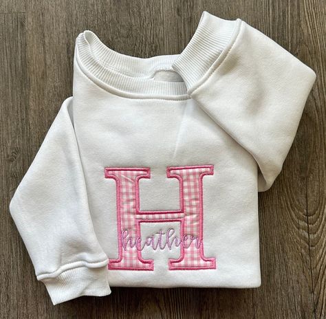 Personalized Applique Name Sweatshirts, Toddler sweatshirts, Applique, Monogram, Monogrammed, Personalized, Gifts for her, Girl Sweatshirts *A proof of monograms will be messaged to you for approval. If not approved in 24hrs your order will be canceled and you will be refunded.  ITEM INFORMATION: Rabbit Skins 3317 Toddler Fleece Sweatshirt IMPORTANT ORDERING INFORMATION: - Please review the sizing charts, with measurements, that are in the listing photos before purchasing.  - Cancellations are accepted within 24 hours of placing your order. After that, your order is possibly in production and we cannot guarantee cancellation.  *RETURNS are NOT accepted for this item since it is personalized! Please feel free to message us if you have any questions. Thank you for choosing Merexi Embroidery! Name Sweatshirt, Monogram Sweatshirt, Applique Monogram, Embroidered Sweatshirt, Personalized Gifts For Her, Fleece Sweatshirt, Embroidery Ideas, Embroidered Sweatshirts, Girl Sweatshirts