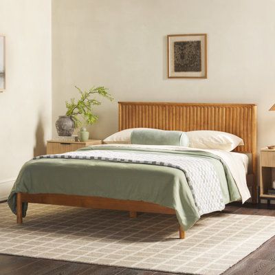 Are you lost in a sea of generic bedroom furniture sets? If so, make your space stand out with this king bed made from sturdy, solid pine wood. Its gorgeous reeded headboard adds effortless texture and interest to your room. The wooden bed is responsibly sourced from renewable forests, this bed is ideal for those concerned about the environment and a good night’s sleep. This king-size bed frame is the ideal size for larger bedrooms or couples who like plenty of room to spread out, and the transi King Size Bed Frame Wood, Reeded Headboard, Wooden Bed Frame Design, California Casual Bedroom, Scandinavian Bed Frames, Wood Bed Headboard, Charleston Apartment, Wooden Queen Bed Frame, Bedroom For Couples