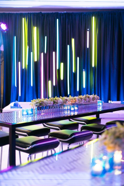 Bright neon decorations for bar or bat mitzvah party. Planning by Lindsay Landman Events. Photo by Christine Chang #barmitzvah #batmitvah #neon #neondecor Neon Party Theme Decorations, Neon Party Centerpiece Ideas, Futuristic Party Decor, Neon Decorations Party, Neon Prom Theme, Neon Centerpieces, Bat Mitzvah Ideas, Neon Party Themes, Bat Mitzvah Decorations