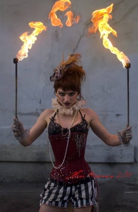 Circus fire eater great outfit little bit steampunk love the corset and striped hotpants combination just needs a purple velvet top hat Steampunk Circus, Circus Fashion, Pierrot Clown, Circus Acts, Circus Sideshow, Dark Circus, Fire Dancer, Circus Costume, Circus Performers