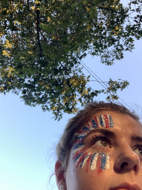 Fnl Face Paint Aesthetic, July 4th Leg Painting, Painting Legs For 4th Of July, Usa Day Spirit Week Outfit Face Paint, 4th Of July Simple Makeup Looks, Eye Black Football Game, Forth Of July Body Art, Fourth Of July Face Paint Adult, Student Section Face Paint Ideas