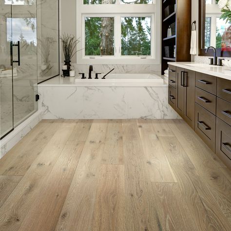 From waterproof (real!) hardwood floors to luxury vinyl, we've uncovered the 5 best flooring options for a bathroom remodel. #bathroomdesign #bathroomflooring #tilebathroom #flooringforbathroom          #bathroomrenovation Wood Floor Bathroom, Bedroom Addition, Real Hardwood Floors, Basement Reno, Oak Bathroom, Waterproof Bathroom, How To Waterproof Wood, Floor Bathroom, Oak Hardwood Flooring