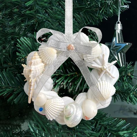 PRICES MAY VARY. Natural Shell Christmas Ornaments: Elevate your Christmas tree with our exquisite handmade ornaments crafted from natural shells. These unique shell crafts will add a touch of elegance and create a distinctive Christmas atmosphere. Easy to Use: Each seashell Christmas tree ornament comes with a ribbon for easy hanging. No tools or complicated installation required. Simply hang them wherever you desire to add a charming coastal touch to your Christmas decorations. Creative Handma Fall Seashell Crafts, Sea Shell Christmas Trees, Sea Shell Christmas Ornament, Sea Shell Ornaments To Make, Shell Stepping Stones, Christmas Seashell Crafts, Seashell Ornaments Diy, Beach Shell Crafts, Beachy Ornaments