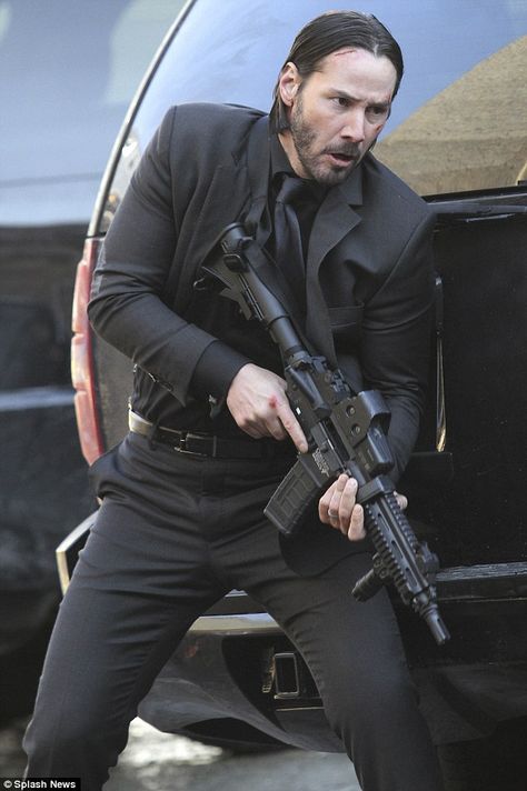 Poised and ready: The star plays the title character in the movie / Keanu Reeves as John Wick Tmax Yamaha, John Wick Movie, Keanu Reeves John Wick, Keanu Reaves, Siluete Umane, Keanu Charles Reeves, The Boogeyman, Jem And The Holograms, Thriller Movie