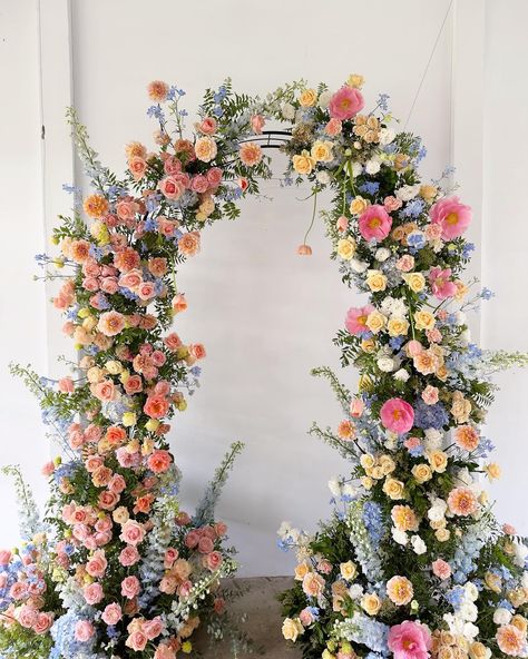 Floral Wedding Wall, Fairytale Wedding Florals, April Wedding Decor, Summer Wedding Activities, Simple Wildflower Wedding Arch, Wedding Colors Late Summer, Colorful Flower Arch, Muted Summer Wedding, Wedding Tent Flowers