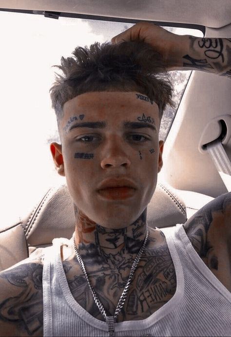 Rappers With Face Tattoos | Cool & Aesthetic Tattoo Ideas For Men Yeat Rapper Tattoos, Rappers Hairstyles, Diamond Face Tattoo, Rapper Hairstyles, Small Face Tattoo Ideas, Face Tattoo Ideas For Men, Aesthetic Tats, Face Tattoo Men, Small Face Tattoo