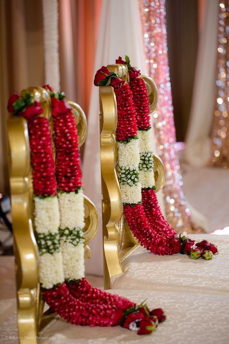 Aon Ballroom Wedding - Hindu celebration - Rebecca Marie Photography  Esha & Kapil's wedding at Aon Ballroom and Navy Pier in Chicago featured gorgeous traditional details, friends and family coming together, and a color palette of blush, bright pink, turquoise, magenta, and ruby. Hindu Wedding Mala, Flower Garlands For Wedding, Pink Garland Indian Wedding, Varmala Indian Weddings Garlands, Marriage Malai Design, Hindu Wedding Garland, Varmala Designs Indian Weddings, Varmala Indian Weddings, Garland Wedding Indian