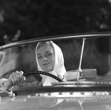 Bert Hardy - A woman driving an MG sports car, Bickley, Kent (25th October 1962) Lady Driver, Woman Driving, Woman In Car, Women Drivers, Advertising Archives, Head Scarf Tying, Vintage Photos Women, Alfred Eisenstaedt, Silk Headscarf